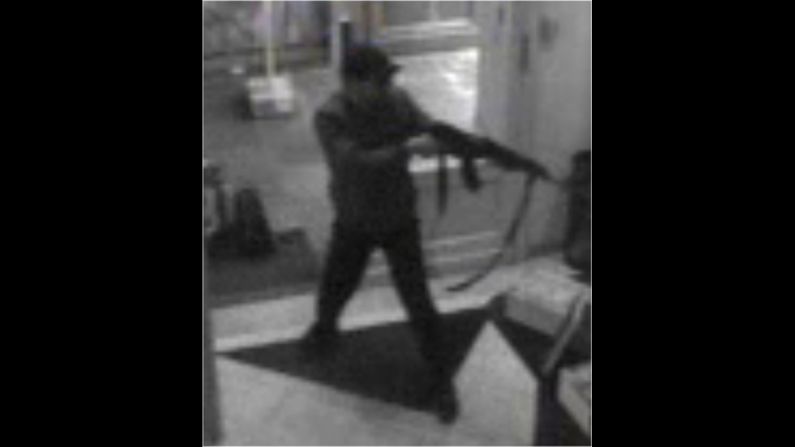 In this hand out photo distributed by the Belgian Federal Police, a surveillance camera shows the suspected killer near the museum on May 24. 