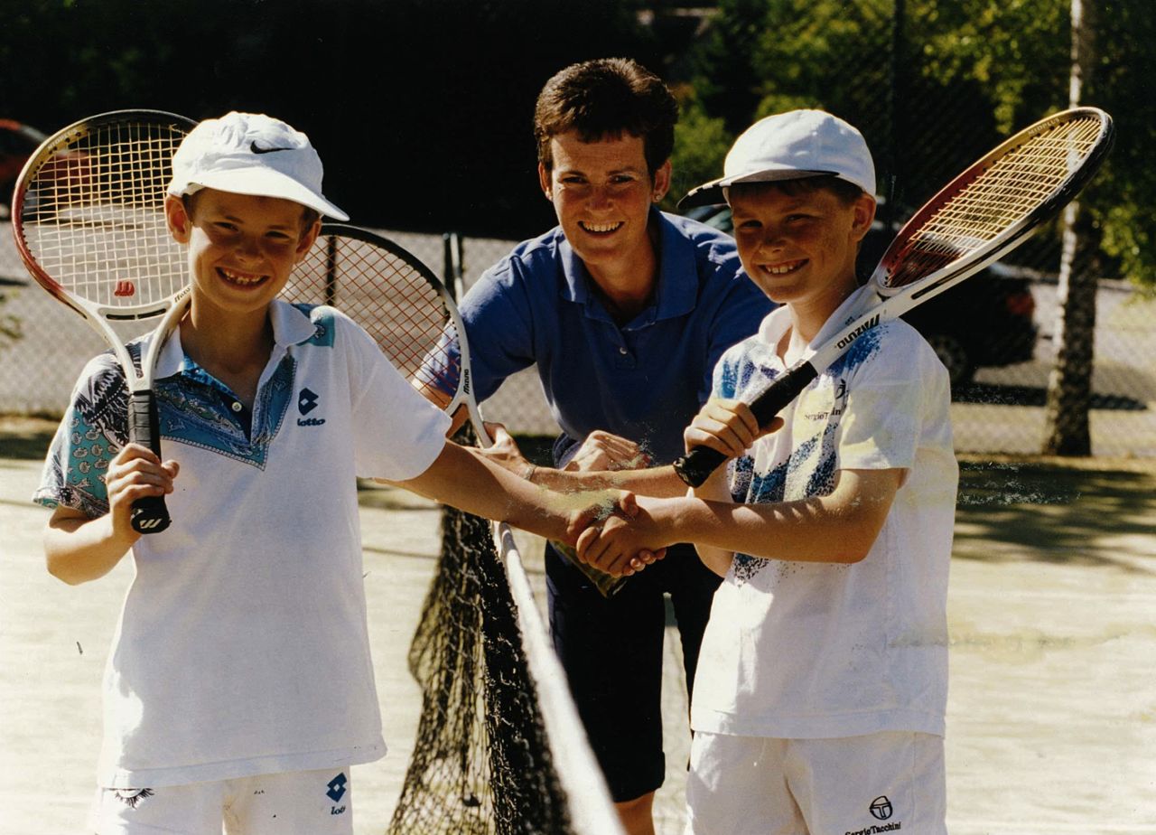 Here, Judy Murray is pictured on a tennis court with her two sons -- older Jamie and younger Andy.