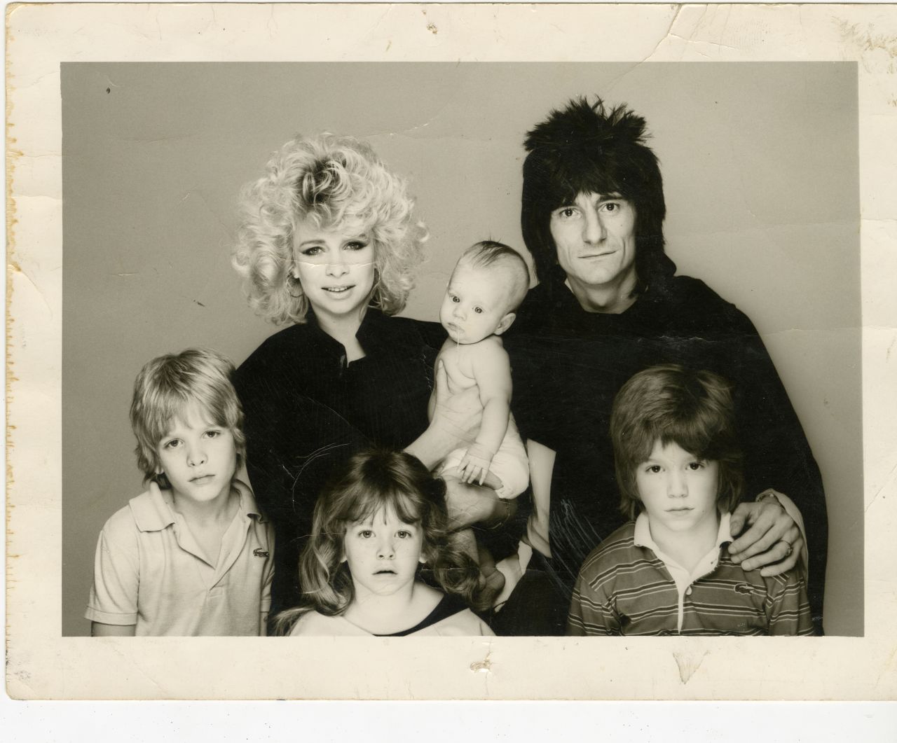 Pictured here is Ronnie Wood with Jo and their children in early 1980s. They had two children together -- daughter Leah and son Tyrone, and they each had one child from previous marriages. 