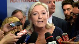 French far-right Front National (FN) party president Marine Le Pen reacts at the party's headquarters in Nanterre, outside Paris, on May 25, 2014. 