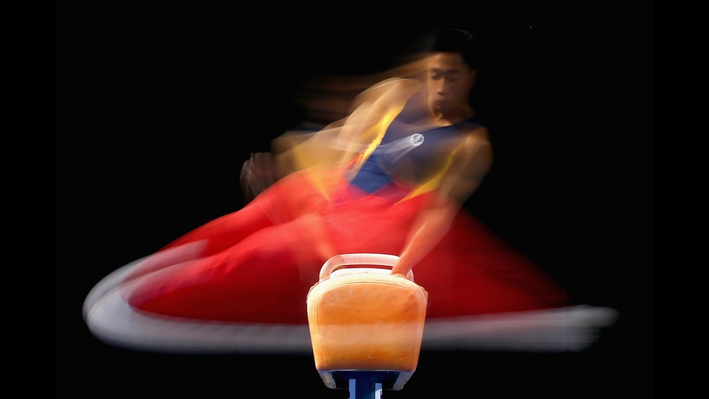 A slow shutter speed was used to grab this photo of gymnast Christopher Rem competing on the pommel horse Saturday, May 24, at the Australian Gymnastics Championships in Melbourne.