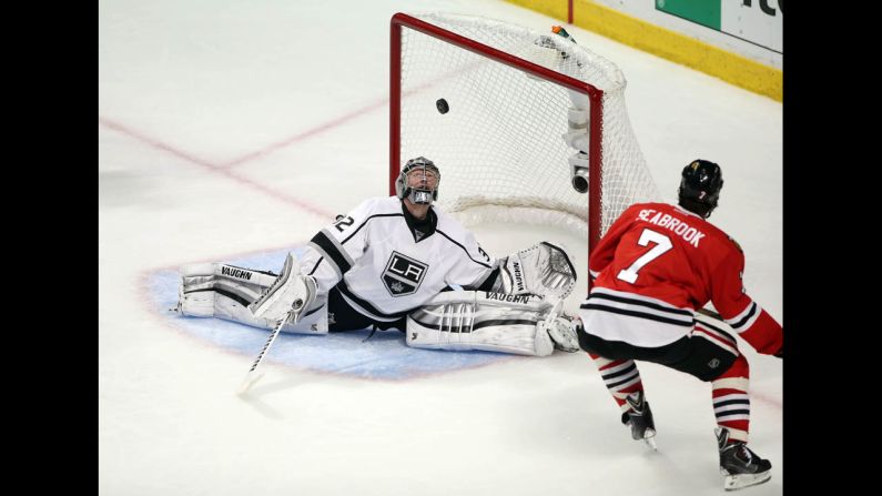 Los Angeles goalie Jonathan Quick makes a save against Chicago defenseman Brent Seabrook during Game 2 of the NHL's Western Conference finals on Wednesday, May 21. The Kings won the game 6-2 to tie the best-of-seven series at one game apiece.