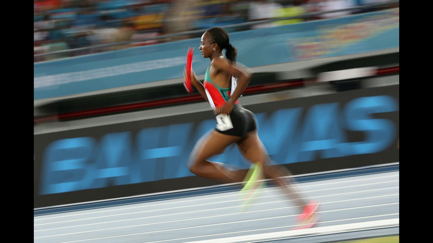 Hellen Onsando Obiri of Kenya runs in the women's 1,500-meter relay Saturday, May 24, at the IAAF World Relays in Nassau, Bahamas. She and the rest of her team set a new world record in the 4x1500, with a mark of 16 minutes, 33.58 seconds.