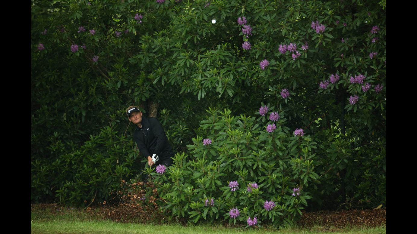 Golfer Soren Kjeldsen hits from a bush during the BMW PGA Championship on Thursday, May 22.