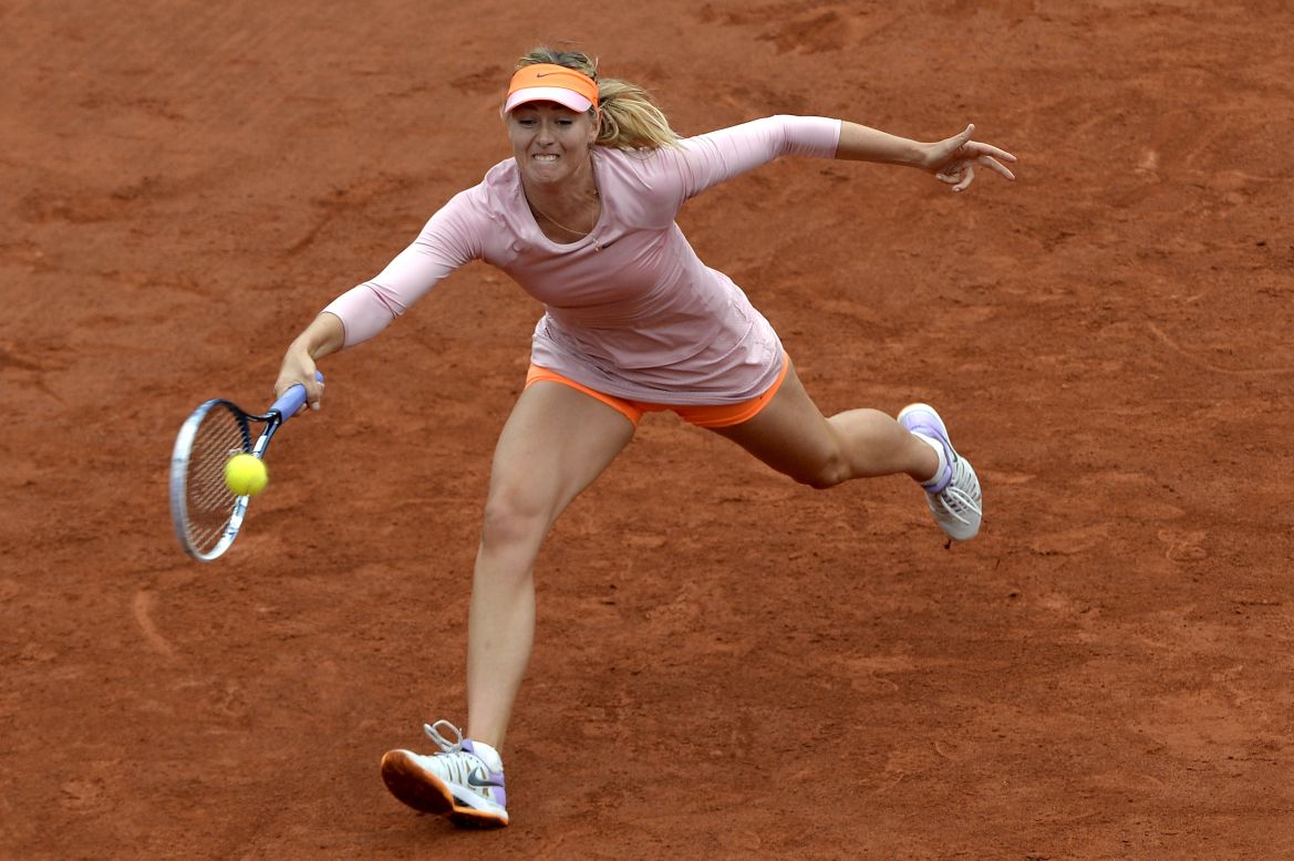 Maria Sharapova has to stretch for a return during her opening round victory at the French Open as she bids for a second title at Roland Garros.