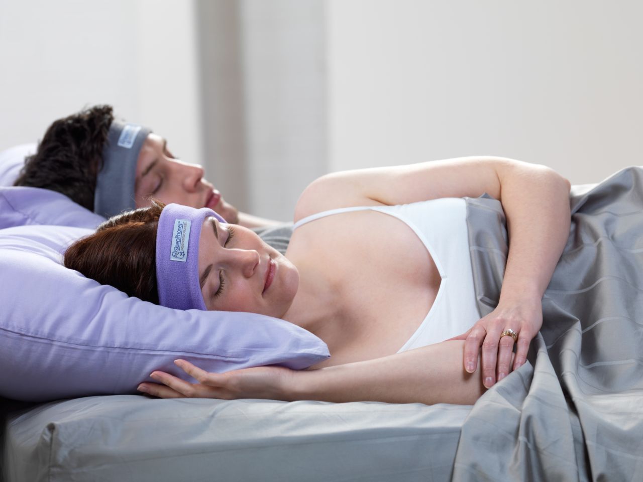 SleepPhones are "headphones in a headband" that fit snugly around your ears and provide hours of audio to help reduce ambient noises. 