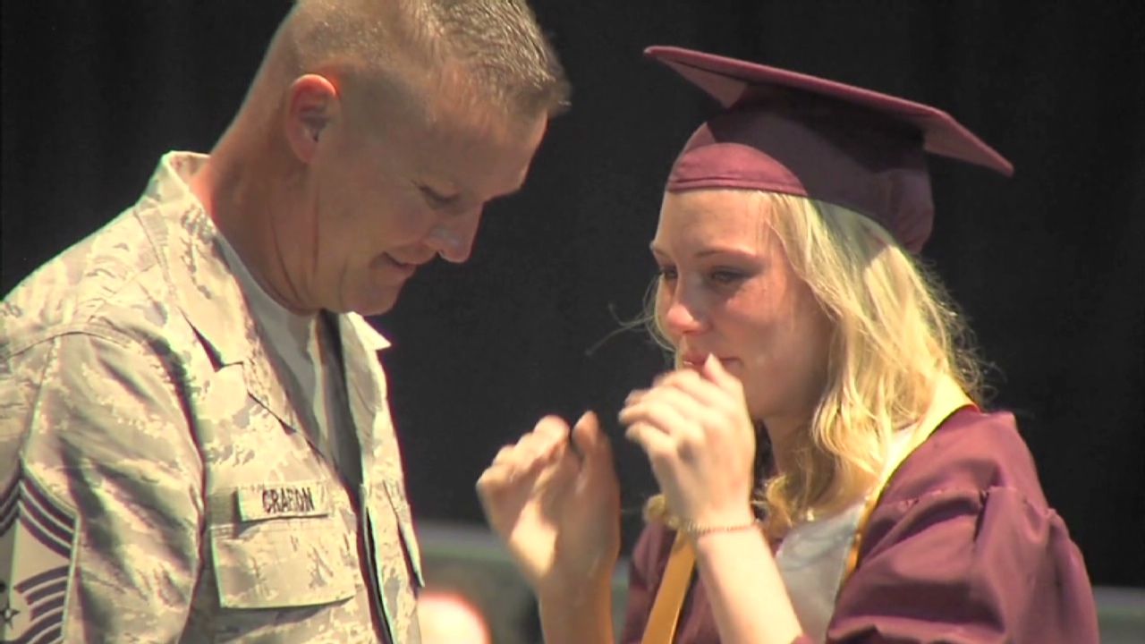 Air Force dad shocks graduating daughter