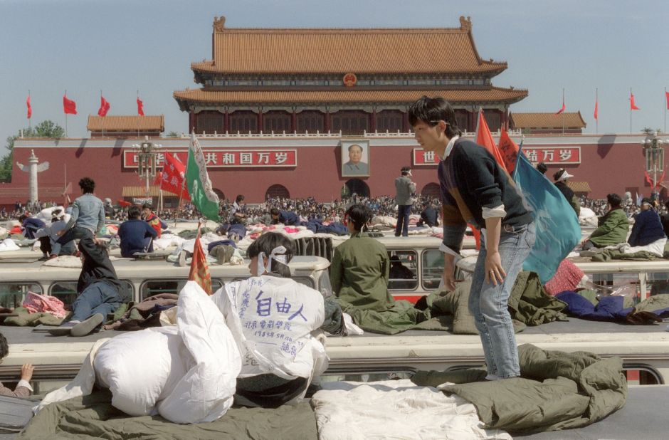 Student hunger strikers camp out on top of buses parked at Tiananmen Square.