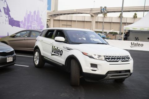 A Range Rover Evoque equipped with Valeo self-parking technology backs into a parking spot during a <a href="http://edition.cnn.com/2014/01/09/tech/innovation/self-driving-cars-ces/">driverless car demo at the International Consumer Electronics Show</a> (CES) in January. 