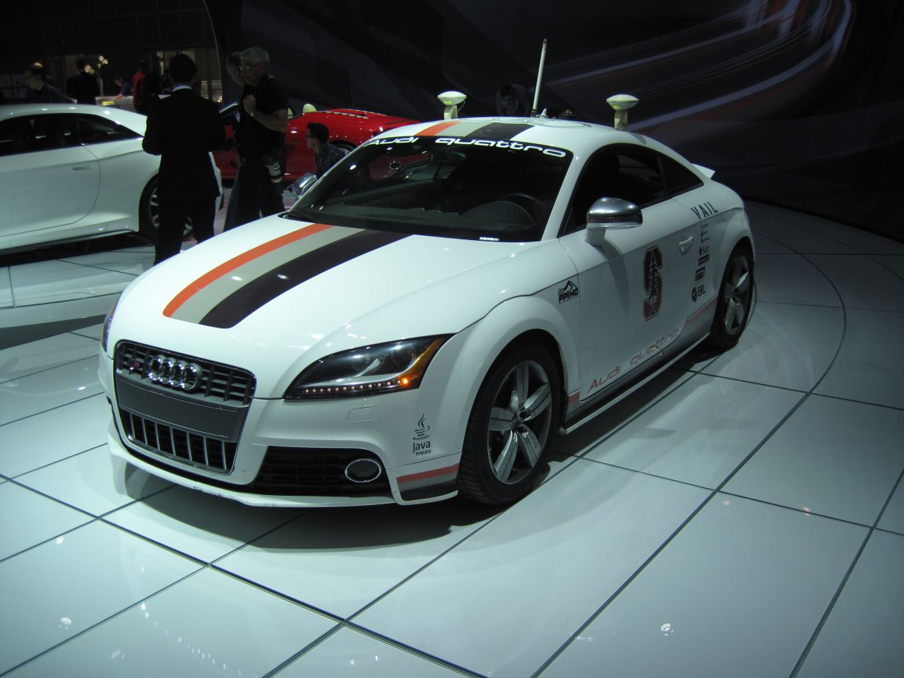 This autonomous Audi TTS Pikes Peak was unveiled in 2010. The vehicle features a pair of trunk-located computers that allow it to drive on the outer edges of its speed and handling limits without a driver. 