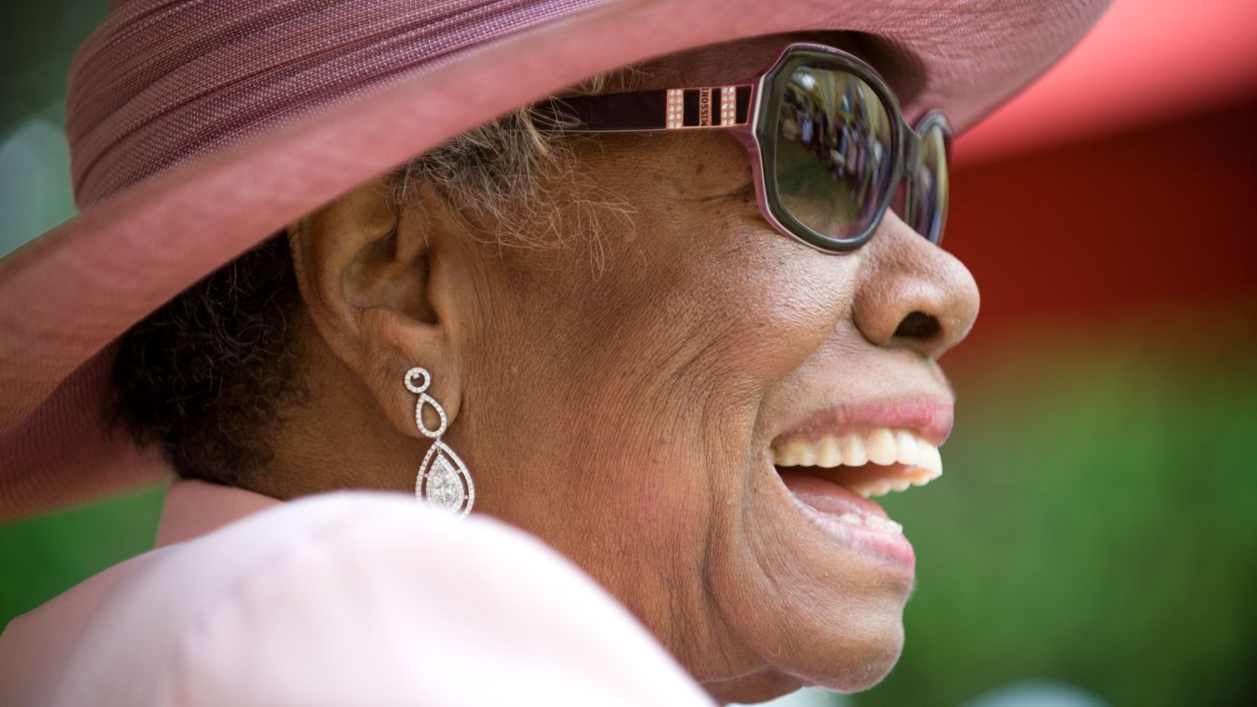 Angelou laughs during her 82nd birthday party at her home in Winston-Salem, North Carolina, in 2010.