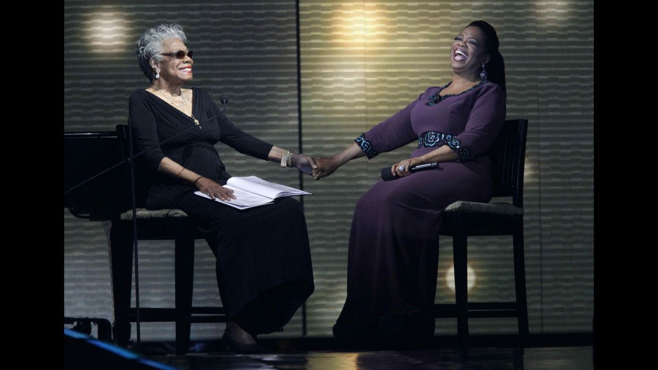 Angelou and talk show host Oprah Winfrey laugh during the taping of "Surprise Oprah! A Farewell Spectacular" in 2011.