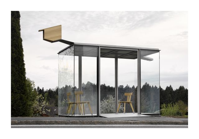 Chilean architect <a  target="_blank" target="_blank">Smiljan Radic</a>, who will also design this year's <a  target="_blank" target="_blank">Serpentine Summer Galler</a>y Pavilion in London, created a glass parlor with rural wooden chairs and a playful birdhouse. 