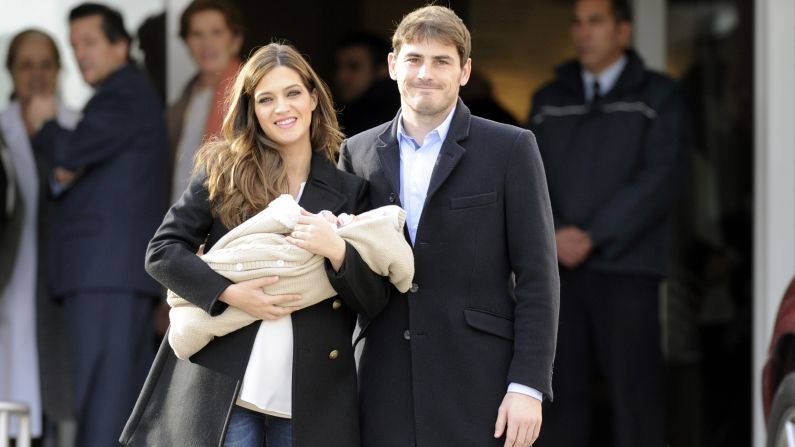 Spanish goalkeeper Iker Casillas isn't the only one carving a career on the field. Sports journalist Sara Carbonero, pictured here with their first child earlier this year, interviewed her thrilled boyfriend after winning the 2010 World Cup. So thrilled in fact, that he ended the interview by kissing her on live TV.  