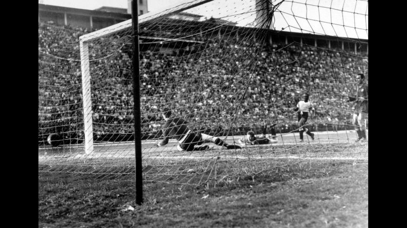 A Ghiggia shot gets past Spanish goalkeeper Antoni Ramallets during a 2-2 draw in Sao Paulo, Brazil. Four teams advanced to the final round of the tournament, which was decided by round-robin group play instead of a series of elimination games.