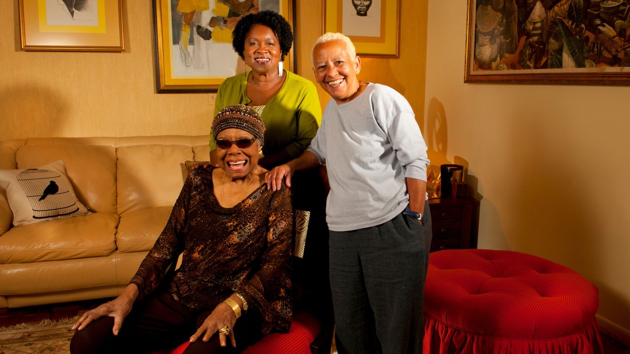 "Doc" Maya Angelou (seated) with Joanne Gabbin (left) and Nikki Giovanni in 2012.