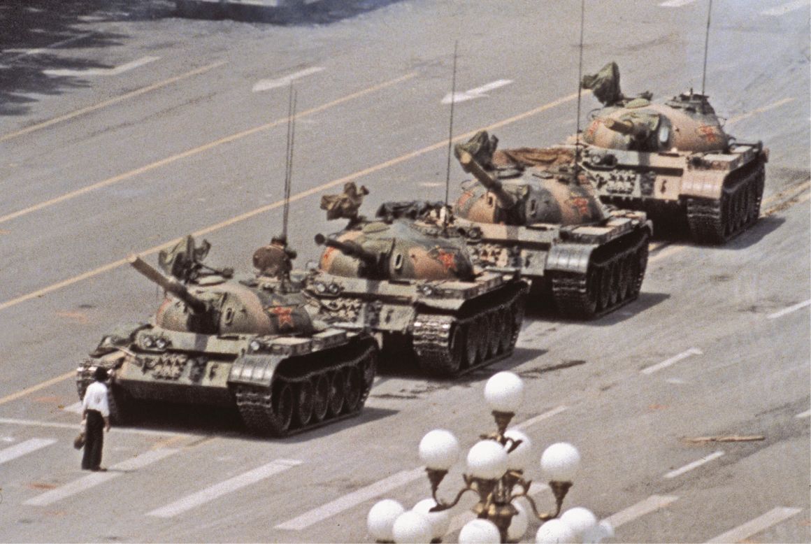 A day after the Chinese military opened fire on protesters in 1989, photographer Jeff Widener was on the sixth-floor balcony of the Beijing Hotel. He was aiming his camera at a row of tanks when the iconic "Tank Man" entered the frame. "The guy walks out with this shopping bag, and I was thinking, 'The guy is going to ruin my composition,' " said Widener, who was with the Associated Press at the time. The photo ended up on the front pages of newspapers all around the world, and it was a finalist for the Pulitzer Prize. 