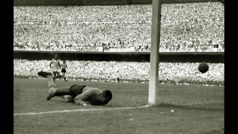 Brazilian goalkeeper Barbosa is beaten at the near post by Ghiggia's game-winning goal. The error that led to the goal <a href="index.php?page=&url=http%3A%2F%2Fwww.cnn.com%2F2013%2F06%2F14%2Fsport%2Ffootball%2Fbrazil-confederations-cup-neymar-pele-football%2F">hung over Barbosa</a> until his death in 2000. Some 20 years after the final, he saw a woman in a supermarket point toward him and say to the young boy by her side: "Look at him, son. He is the man that made all of Brazil cry."