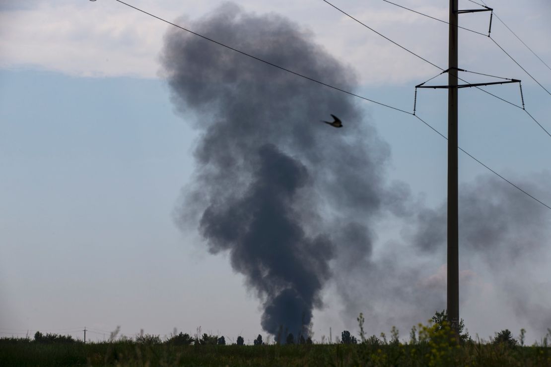 Smoke rises from a shot-down Ukrainian army helicopter outside Slovyansk, Ukraine, on Thursday.