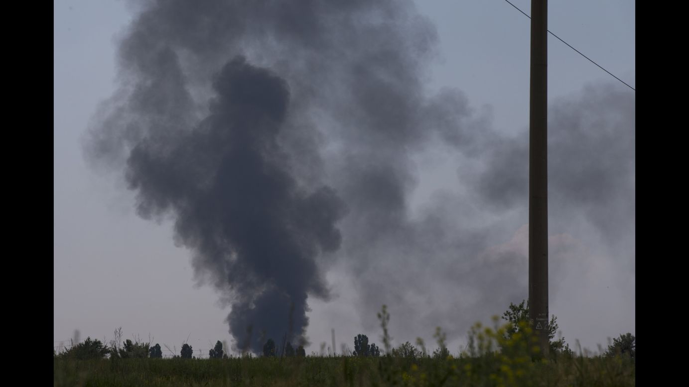 Smoke rises from a shot-down Ukrainian Army helicopter outside Slovyansk on May 29.