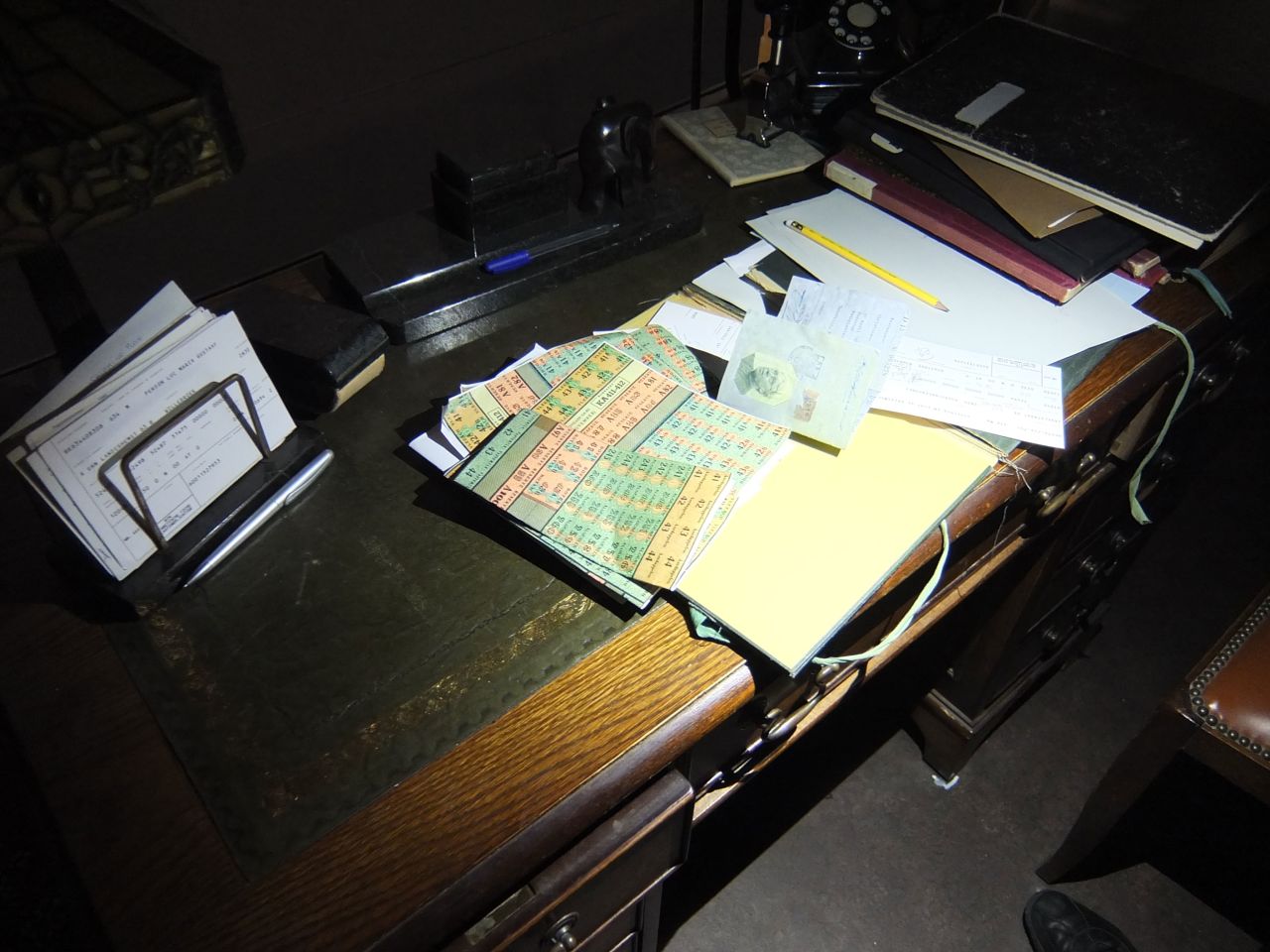 Unseen by the audience, a desktop featured in one scene is covered in realistic wartime documents, showing the production's intense attention to detail.