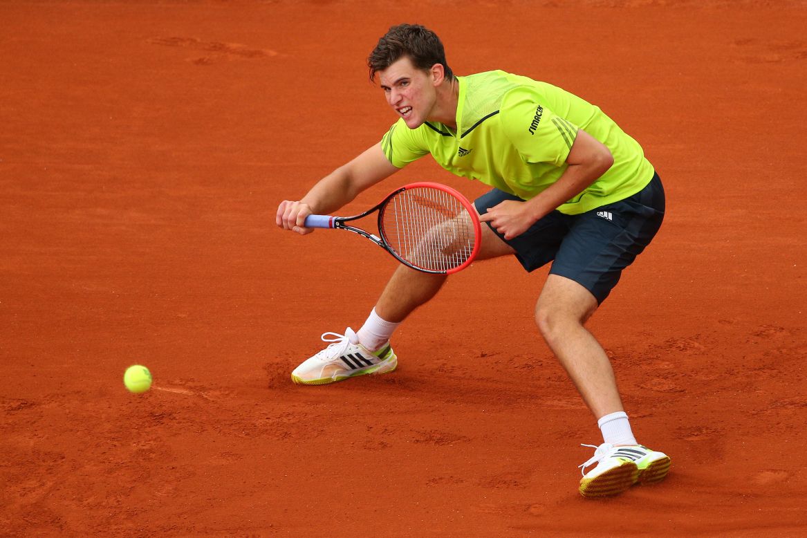 Thiem stretches to return a ball during his two-hour encounter  against Nadal at Roland Garros.