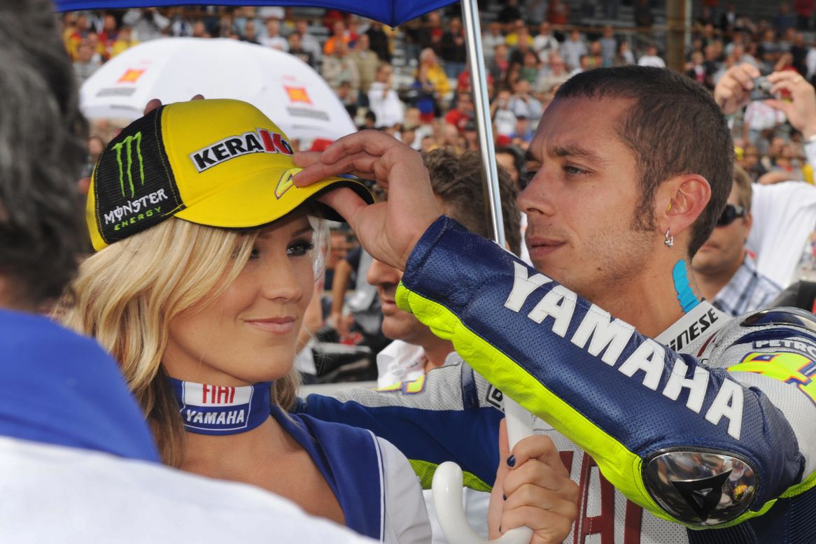 Rossi jokes with a grid girl before the U.S. MotoGP in Indianapolis in 2009.  