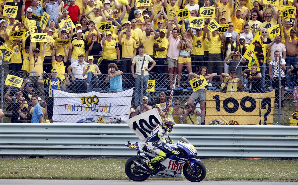 Rossi's fanatical fans celebrate his 100th grand prix win at the Dutch MotoGP at Assen in the Netherlands in 2009.