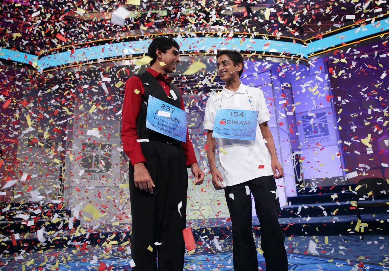 Ansun Sujoe, left, and Sriram Hathwar became co-champions of the 2014 Scripps National Spelling Bee competition  Sujoe spelled the word "feuilleton" and Hathwar spelled the word "stichomythia."  They both spelled their words correctly as they exhausted the words on the bee's list, becoming the first co-champions since 1962. 