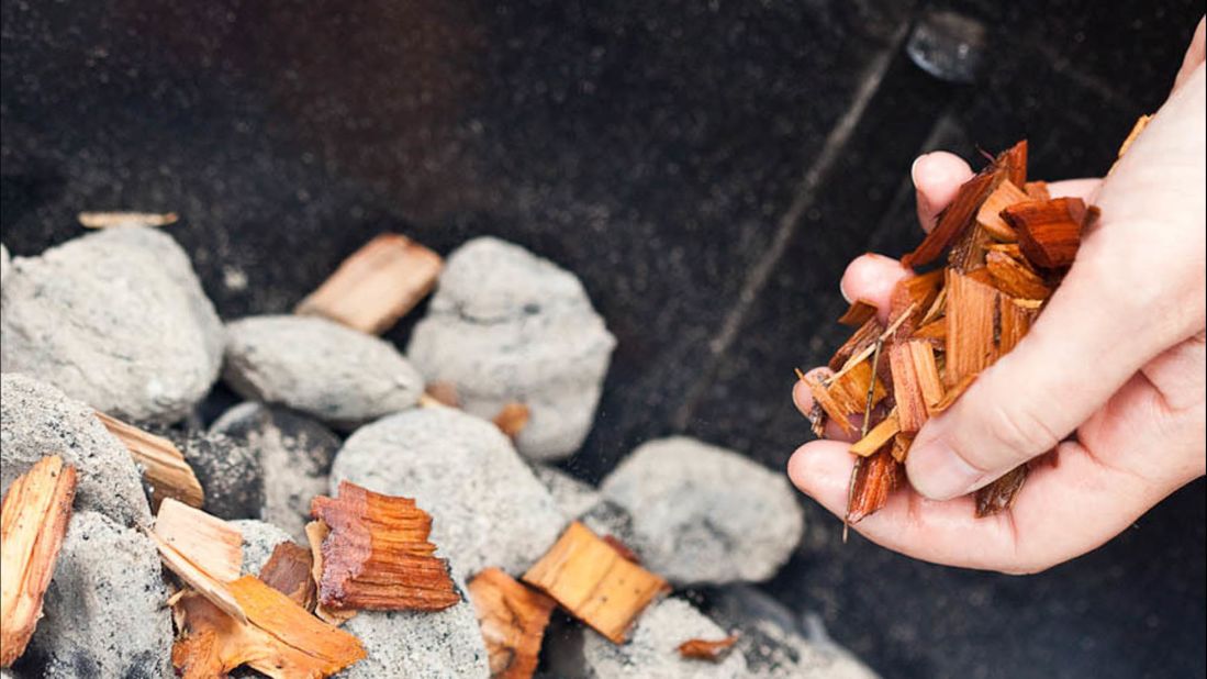For killer ribs, you don't need a giant, pro-style smoker. All it takes is a grill, some wood chips, and a disposable roasting pan filled with water to convert a into a makeshift smoker.