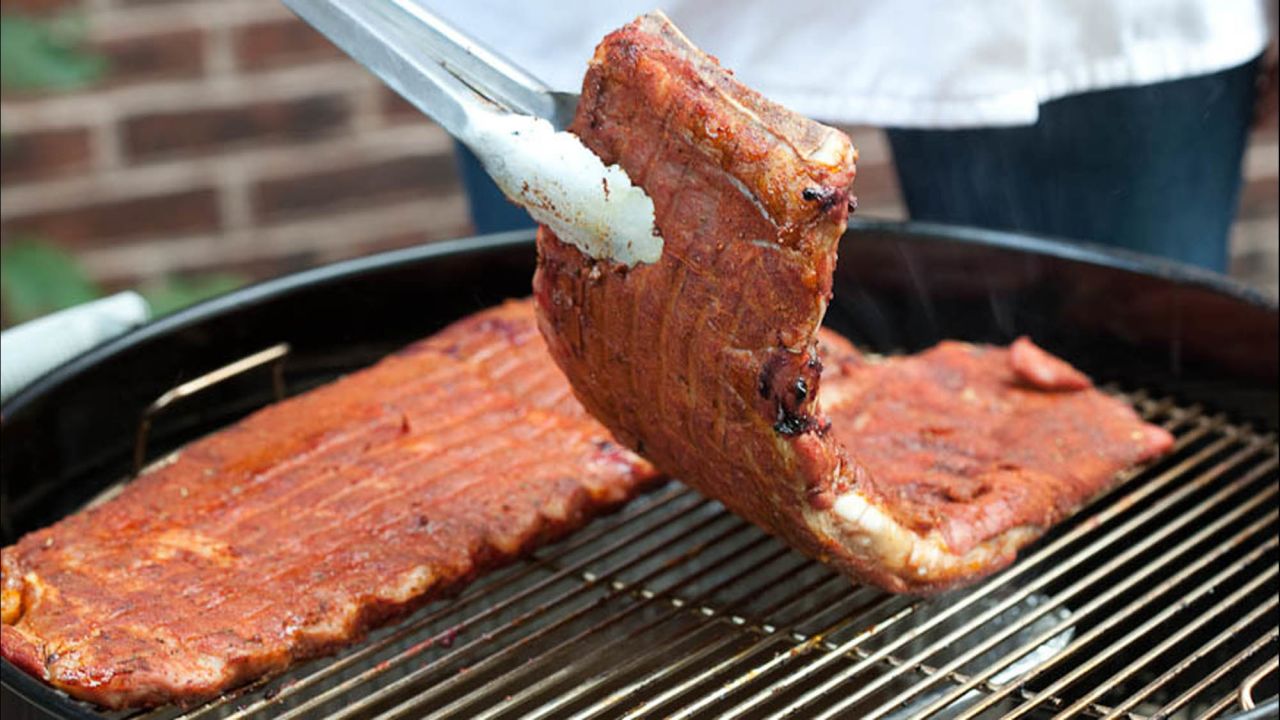 Thanks to our grill setup, we get great smoke flavor by grill-smoking the ribs for 1½ hours.