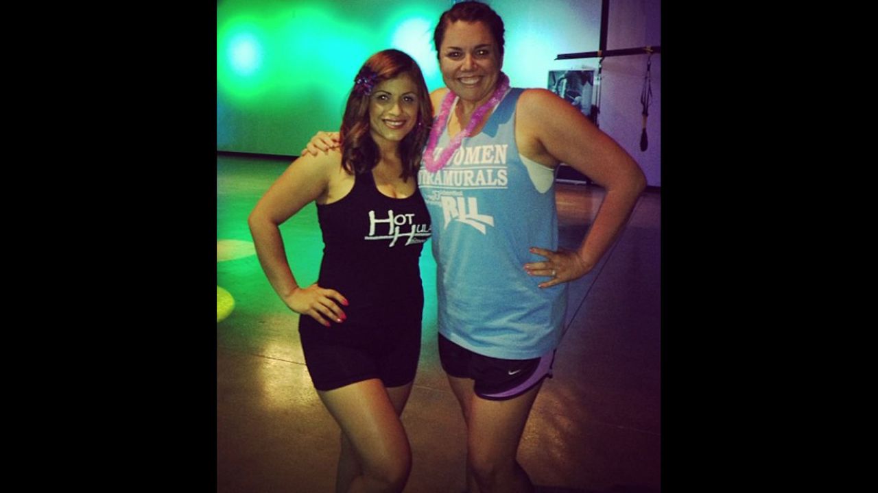 March 2013: Tarver, right, poses with Zumba instructor Catalina Salas a few months after starting classes. "An old  roommate in college had given me that shirt ... and it was tight on me when I borrowed it.  When I noticed how baggy it looked here, I knew I was really making headway in my weight loss journey."