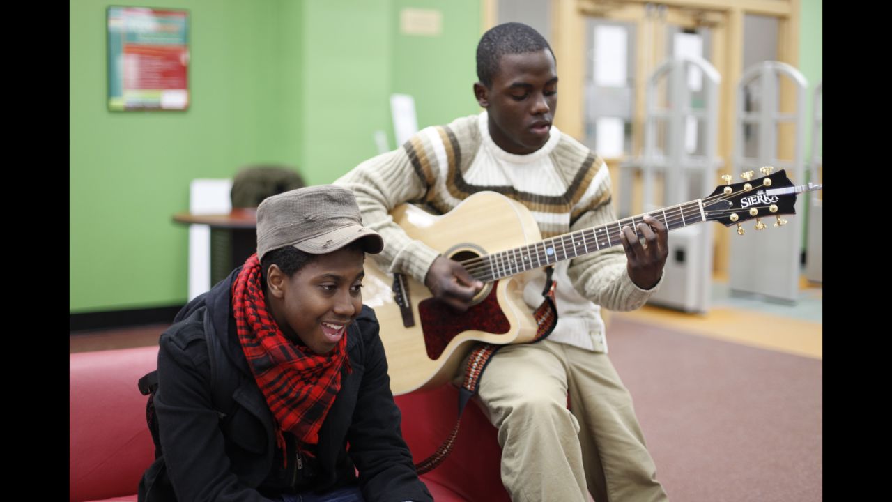 YOUmedia has a studio recording space where teens can use instruments and learn to mix tracks.