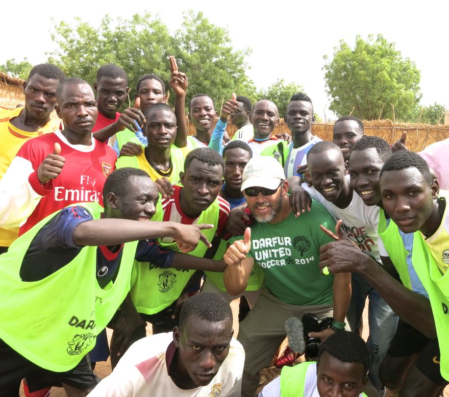 The Darfur players pose with i-ACT founder and executive director Gabriel Stauring ahead of the trip to Ostersund.