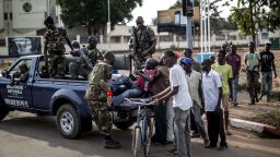 Members of the Central African Republic's National Gendarmerie help to carry a wounded civilian off his bike onto a truck heading to the hospital in the central district of Bangui on May 29, 2014. At least 15 people, including a priest, were killed and several others wounded in clashes on the eve in the capital of the strife-torn Central African Republic, a military source said.
AFP PHOTO/MARCO LONGARIMARCO LONGARI/AFP/Getty Images