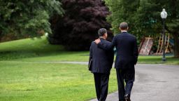 President Barack Obama walks with former VA Secretary Eric Shinseki as he offered his resignation Friday.