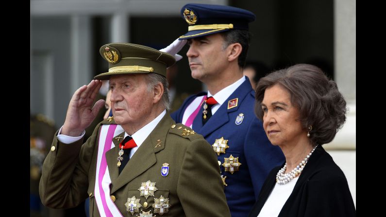 Spain's King Juan Carlos I, left, announced Monday, June 2, that he would be handing over the throne to Crown Prince Felipe, center. Juan Carlos, 76, oversaw Spain's transition from dictatorship to democracy after the death of Francisco Franco in 1975.