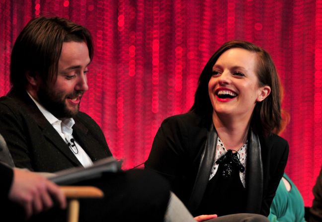Moss, seen here with actor Vincent Kartheiser at The Paley Center For Media's PaleyFest 2014 in Hollywood, California, usually sports a much less severe look. 