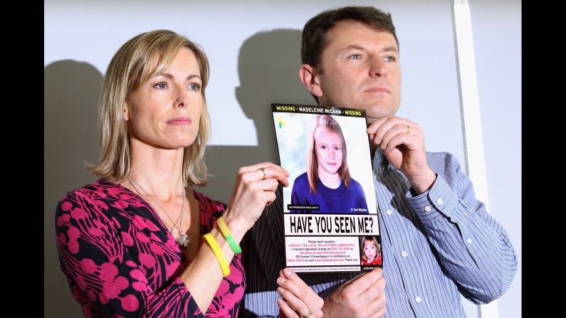 The McCanns hold an age-progressed police image of Madeleine during a May 2012 news conference to mark the fifth anniversary of her disappearance.