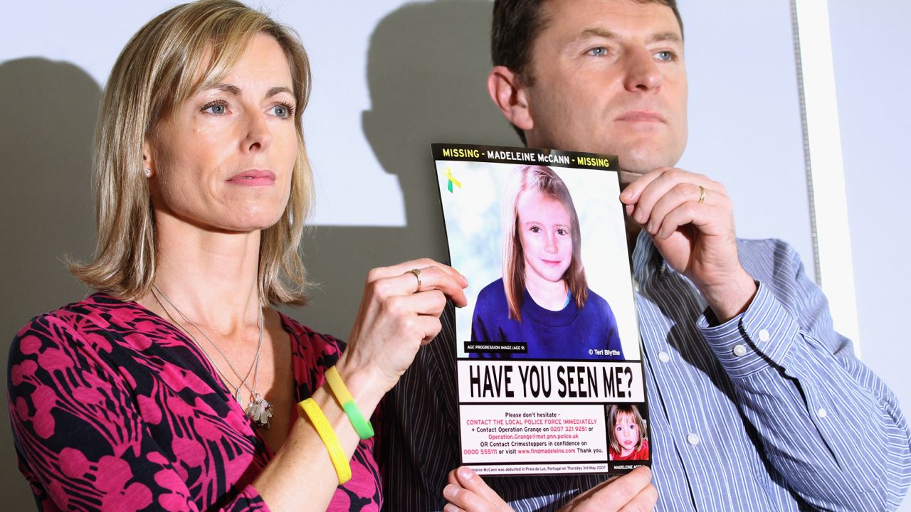 Kate and Gerry McCann hold an age-progressed police image of Madeleine during a news conference in London on the 5th anniversary of her disappearance in May 2012.
