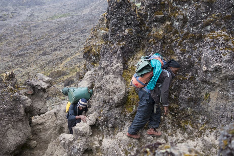The Great Baranko Wall (also spelled Barranco), a cliff 300 meters high, is one of the most dangerous sections on the mountain. Porters carrying heavy weights on their shoulders struggle to balance on the tiny passages.