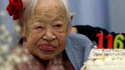 OSAKA, JAPAN - MARCH 05:  Misao Okawa, the world's oldest Japanese woman looks on her 116th birthday celebration at Kurenai Nursing Home on March 5, 2014 in Osaka, Japan. Okawa, born in Tenma, Osaka, on March 5, 1898 to a family of Kimono merchants, married in 1919 and had three children, of which a daughter and a son are still alive, and has four grandchildren and six great-grandchildren.  (Photo by Buddhika Weerasinghe/Getty Images)
