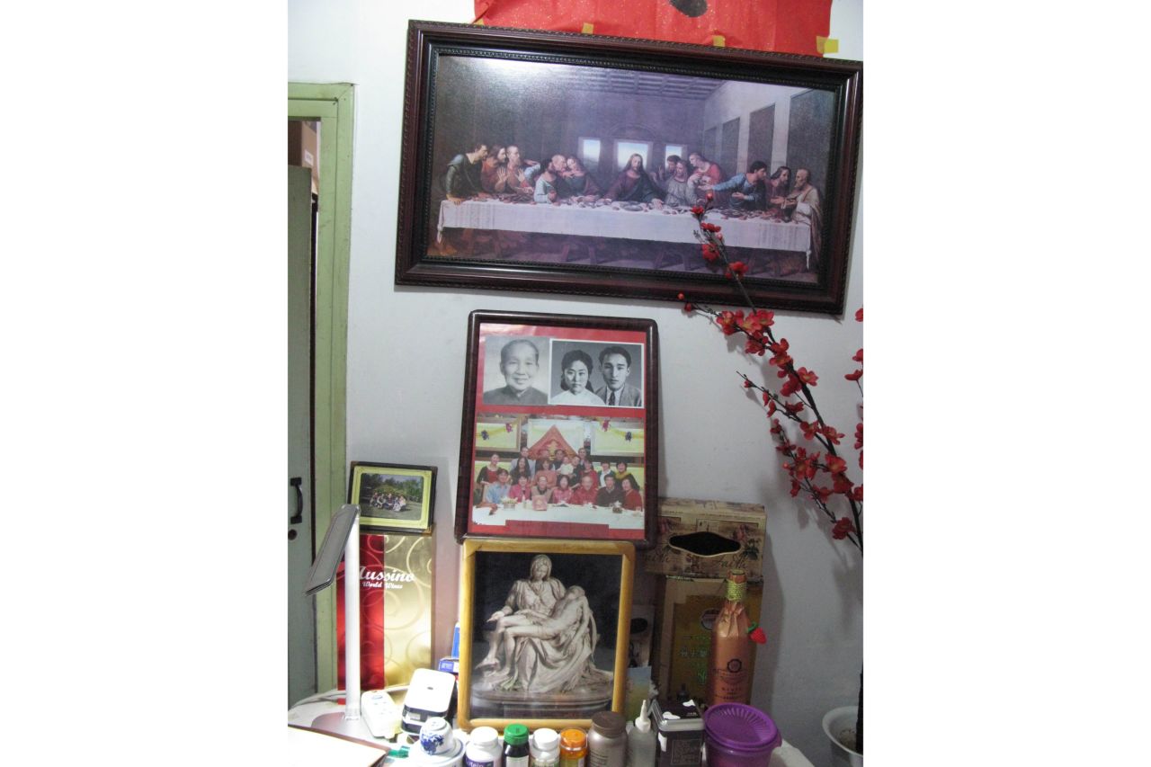 Wang Jingyao keeps a modest shrine to his wife in his cramped apartment. He isn't a religious man, but the Last Supper reminds him of the last meal he had with his wife the night before she was murdered. 