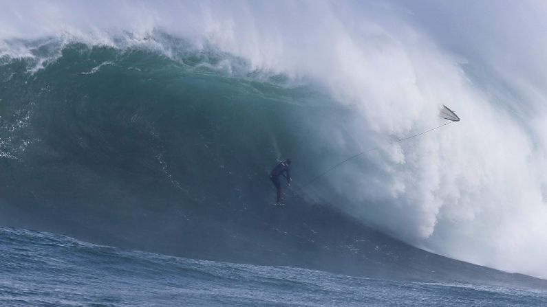 Surfer Mike Schlebach wipes out while trying to ride a wave Thursday, May 29, at an offshore reef known as Dungeons in Cape Town, South Africa. Professional big wave surfers are training for the Dungeons Challenge, which will take place before the end of August.