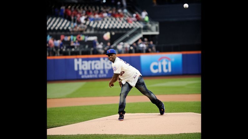 Rapper 50 Cent <a href="index.php?page=&url=http%3A%2F%2Fm.mlb.com%2Fvideo%2Fv33211751%2Fpitnym-50-cent-goes-wide-left-with-first-pitch%3FpartnerId%3Das_mlb_20140527_24789106" target="_blank" target="_blank">throws out the first pitch</a> at New York's Citi Field before a Major League Baseball game between the New York Mets and the Pittsburgh Pirates on Tuesday, May 27. It didn't even come close to the plate, prompting some to call it the worst first pitch ever thrown.