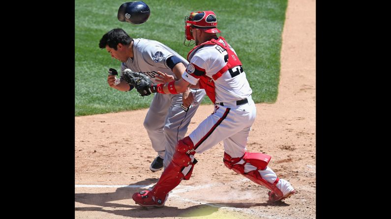 Catcher Tyler Flowers of the Chicago White Sox tags Carlos Quentin of the San Diego Padres during a collision at home plate Saturday, May 31, in Chicago. The Padres won 4-2 and took two of three in the series.