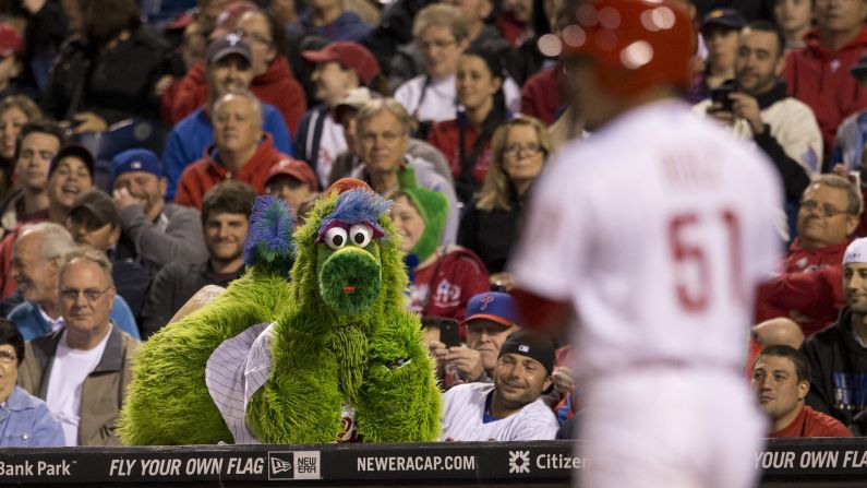 The Phillie Phanatic mascot rests on top of a dugout Thursday, May 29, as he watches the Philadelphia Phillies take on the New York Mets at Citizens Bank Park. <a href="index.php?page=&url=http%3A%2F%2Fwww.cnn.com%2F2014%2F05%2F27%2Fworldsport%2Fgallery%2Fwhat-a-shot-0527%2Findex.html">See 36 amazing sports photos from last week</a>