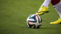 A German player warms up with the Brazuca, the official football of the 2014 World Cup, prior to a friendly football match between Germany and Poland at the Imtech arena in Hamburg on May 13, 2014. AFP PHOTO / ODD ANDERSENODD ANDERSEN/AFP/Getty Images