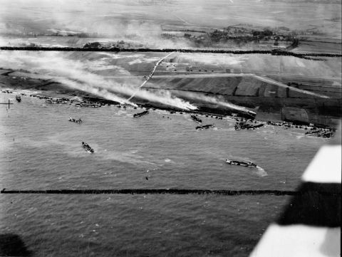 The British Army's 50th Infantry Division lands on beaches in Normandy.