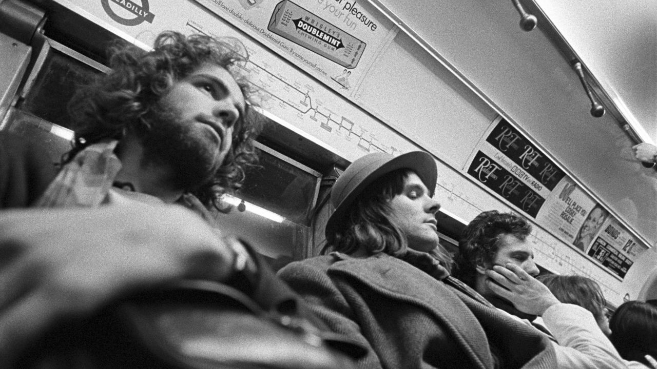 Mazzer, in a self-portrait taken while he was at the Hornsey College of Art. The snap, taken in the the early 70s, was designed to capture the passenger next to him. Mazzer liked his hat and double-breasted herringbone coat with, with its huge lapel and "pointy bits."